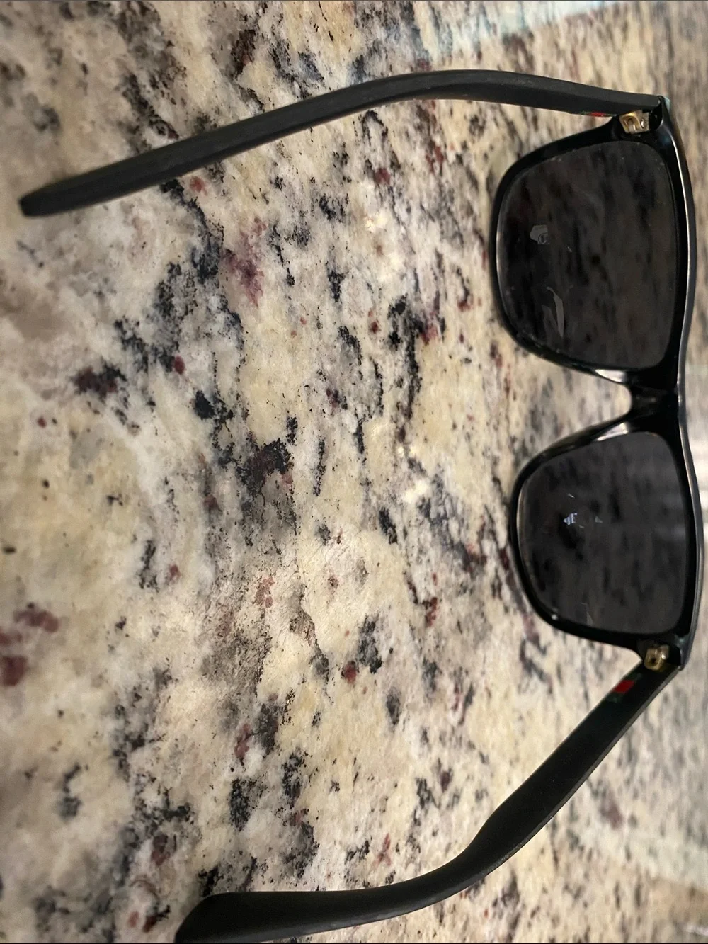 Gucci GG0010S Black Glossy Oversized Sunglasses with Dark Lenses